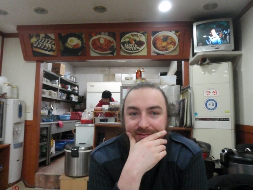 A few pictures hanging over the kitchen