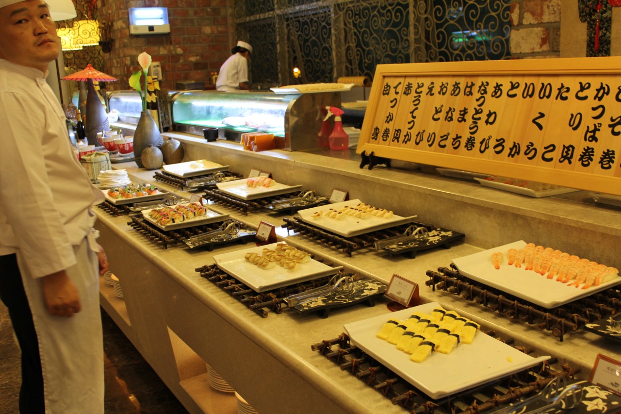 sushi, and an unimpressed sushi chef 'bloody tourists!!!"